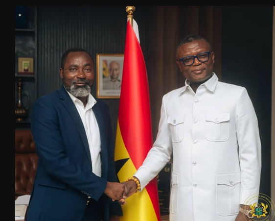 Mr Osei Asibey (left) with Sports and Recreation Minister Mr Adams